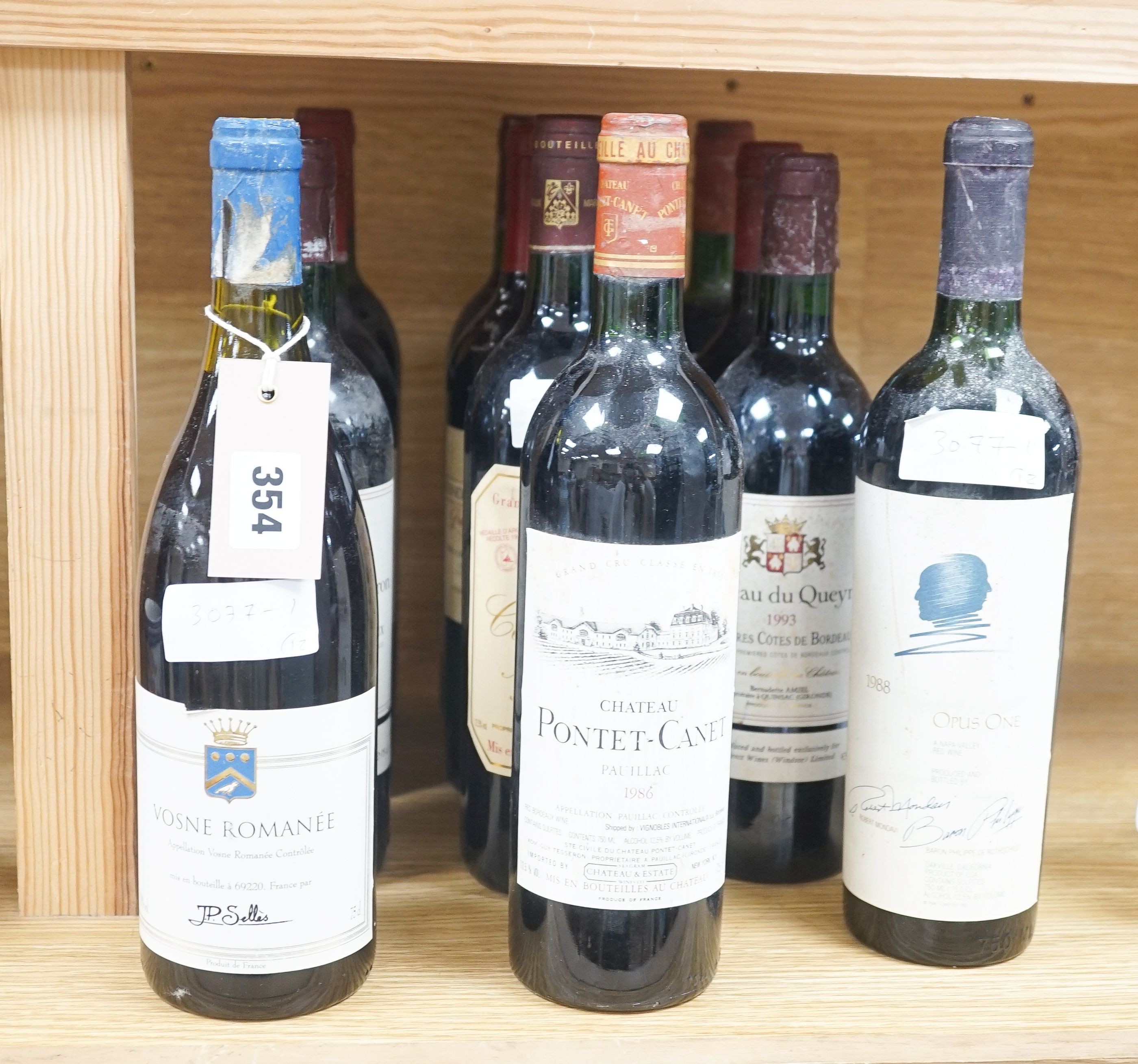Twelve assorted bottles of wine including one Opus One, 1988, one Vosne Romanee, Jean Paul Selles, 1992, one Chateau Cazauviel, Margaux 1993, Chateau Pontet-Canet, 1986 and Brunello Montalcino, 1985 & 1991 etc.